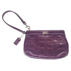 COACH eggplant patent leather monogram wristlet